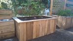 raised garden bed using pallets.jpg