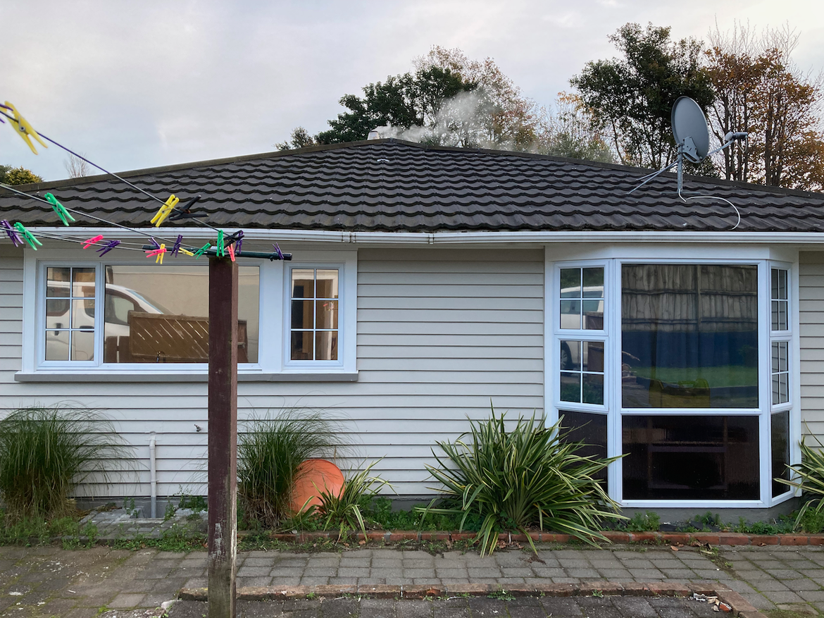 The window on the left has light behind it