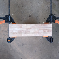 1.2 Upright boards clamped together for sanding.png