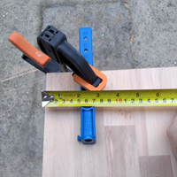 2.2 Kreg guide clamped in postion on edge of upright board.png