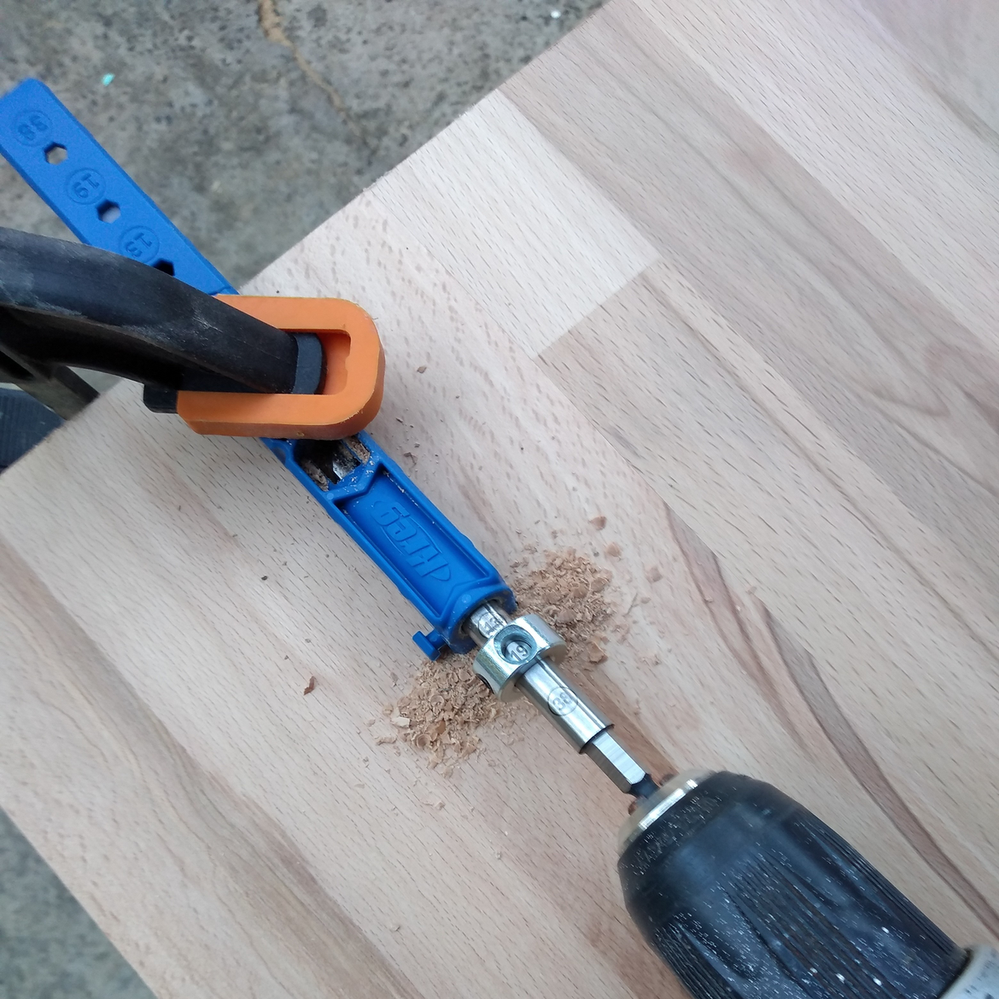 2.3 Drilling upright with Kreg guide.png