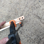 8.3 Screwing pegboard surround together.png