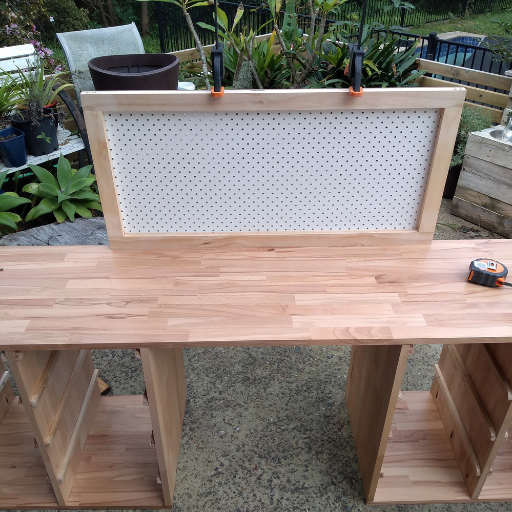 8.8 Pegboard clamped in postion.png