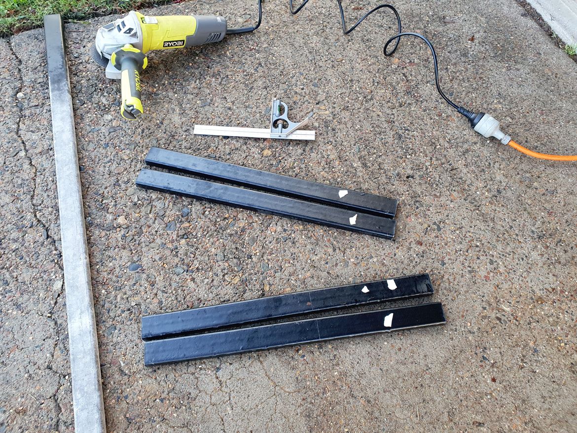 I had a length of steel I cut up and painted for use as brackets