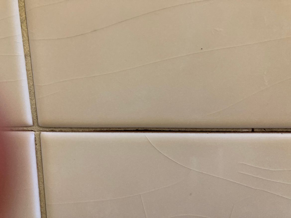 gap is just above bottom tile