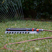 A sprinkler with adjustable throw makes watering more efficient.