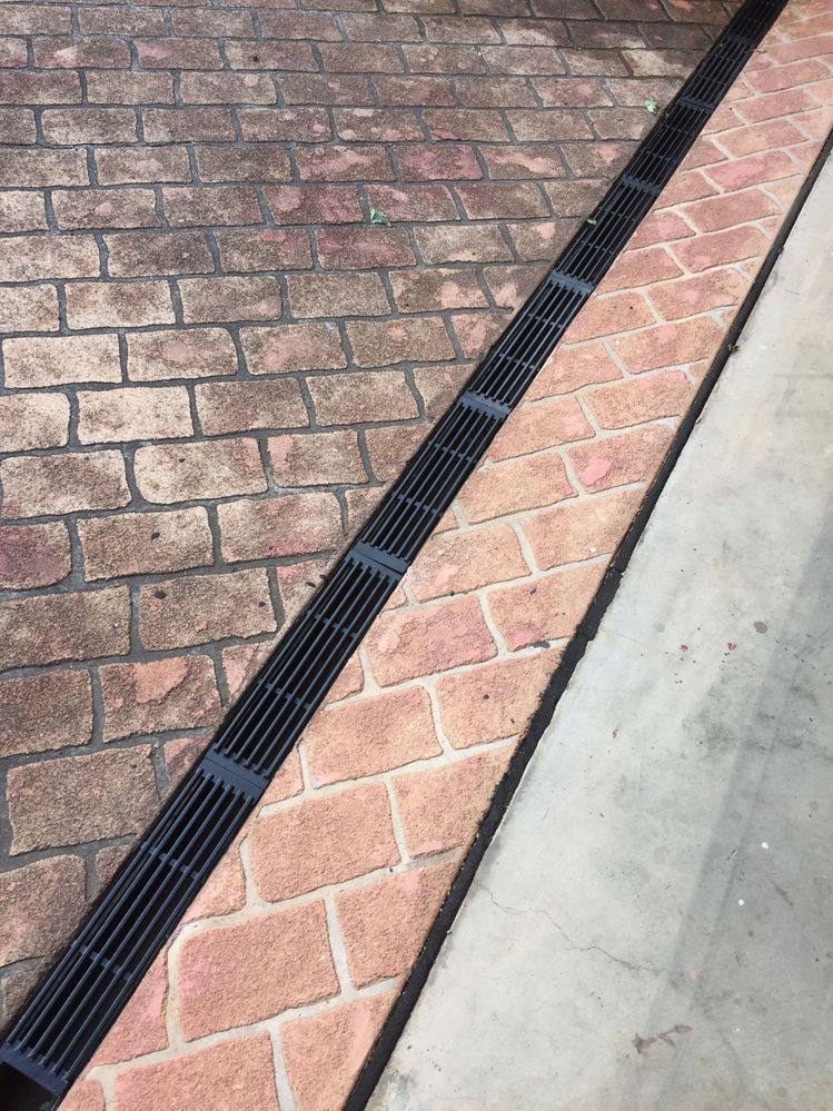 Cast iron BBQ grill drain cover.JPG