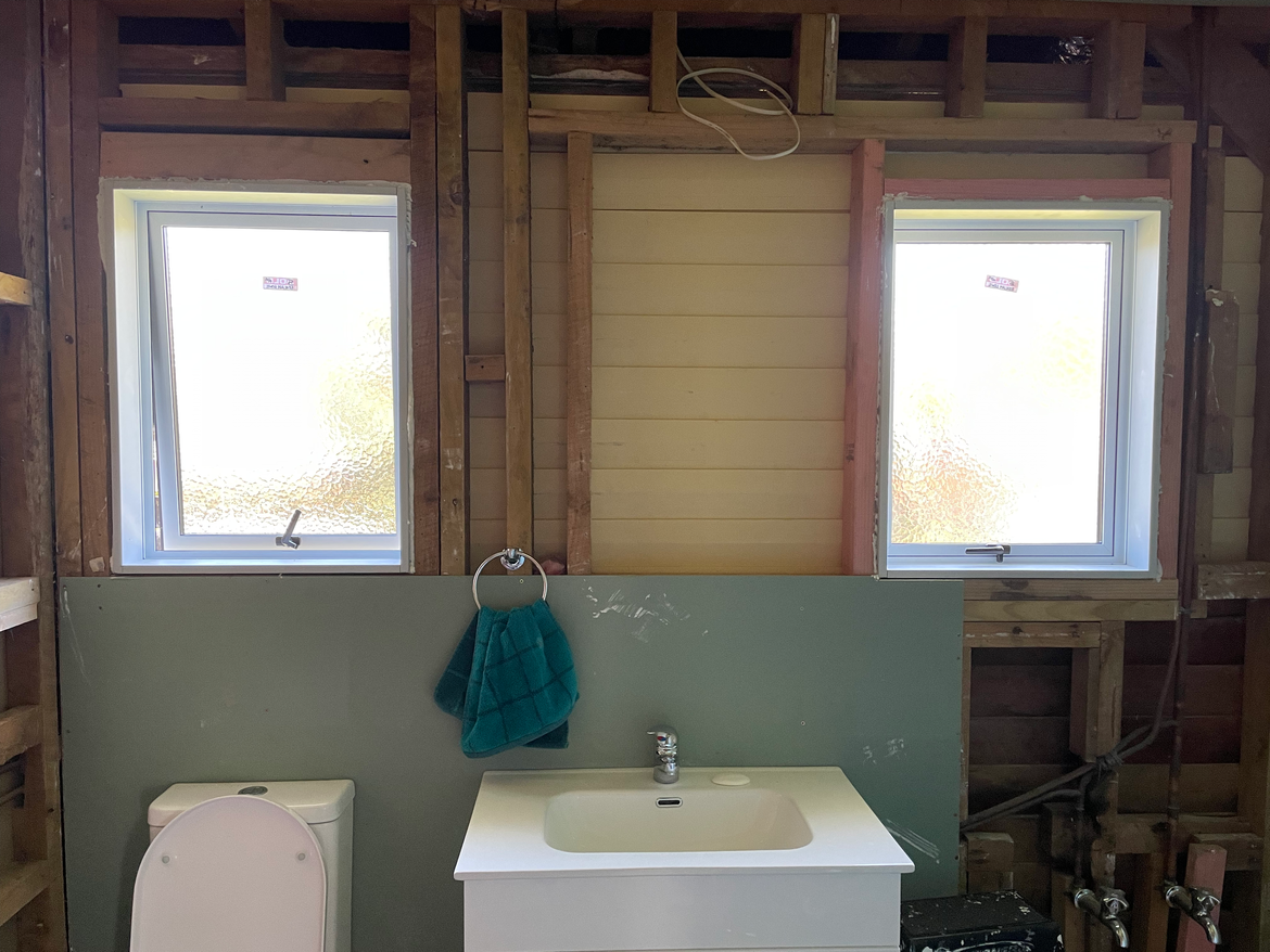New windows, toilet, and basin