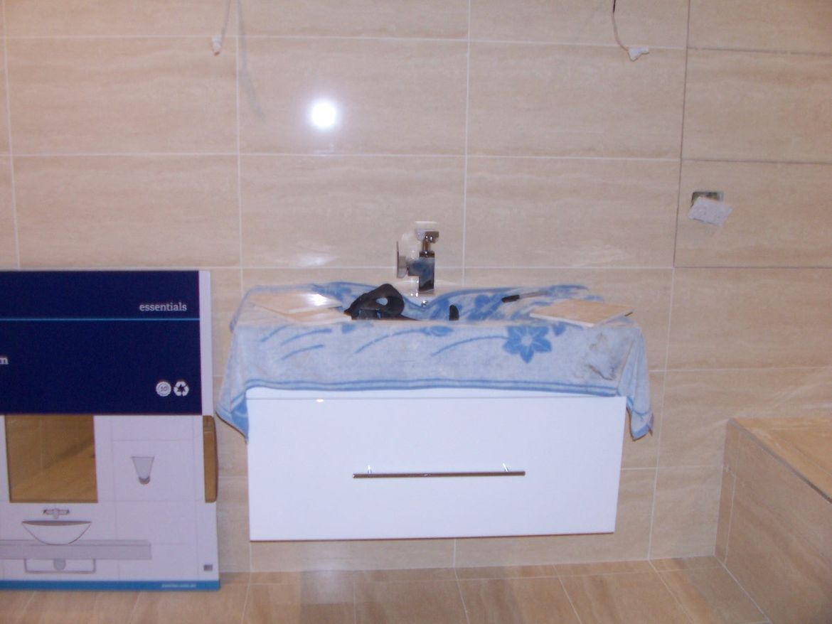 Bathroom Vanity Hung.JPG