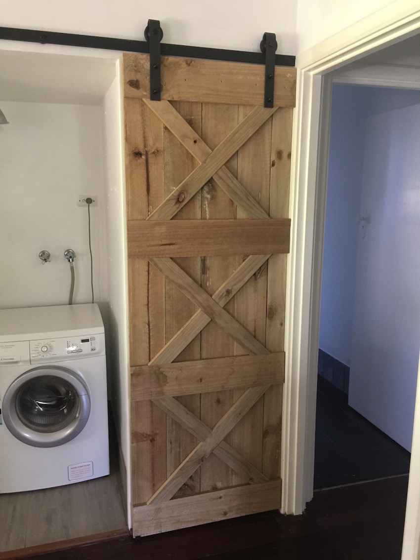 Feature wall and barn door using fence p... Bunnings community