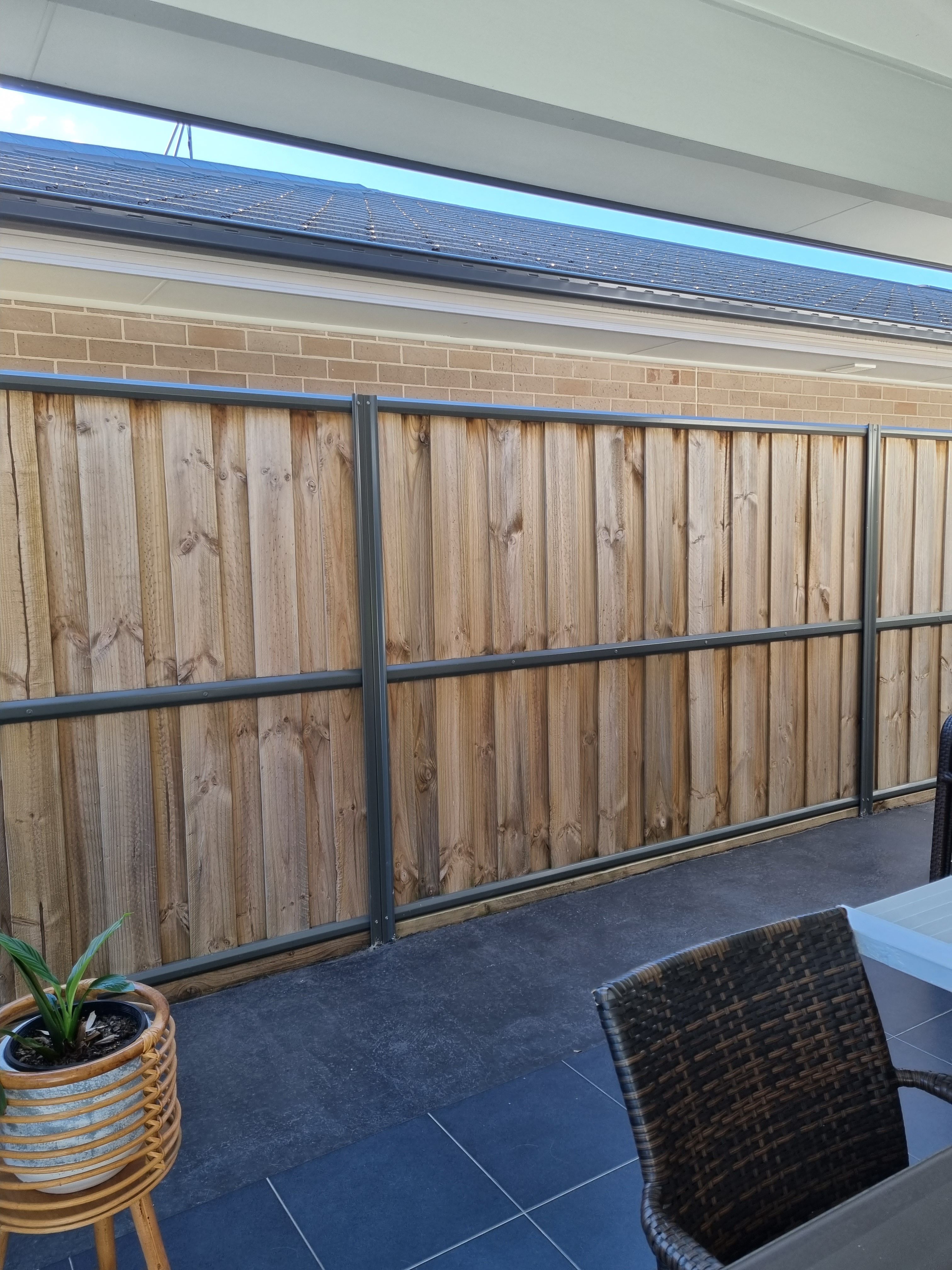 Artificial hedge outdoor feature wall Bunnings community