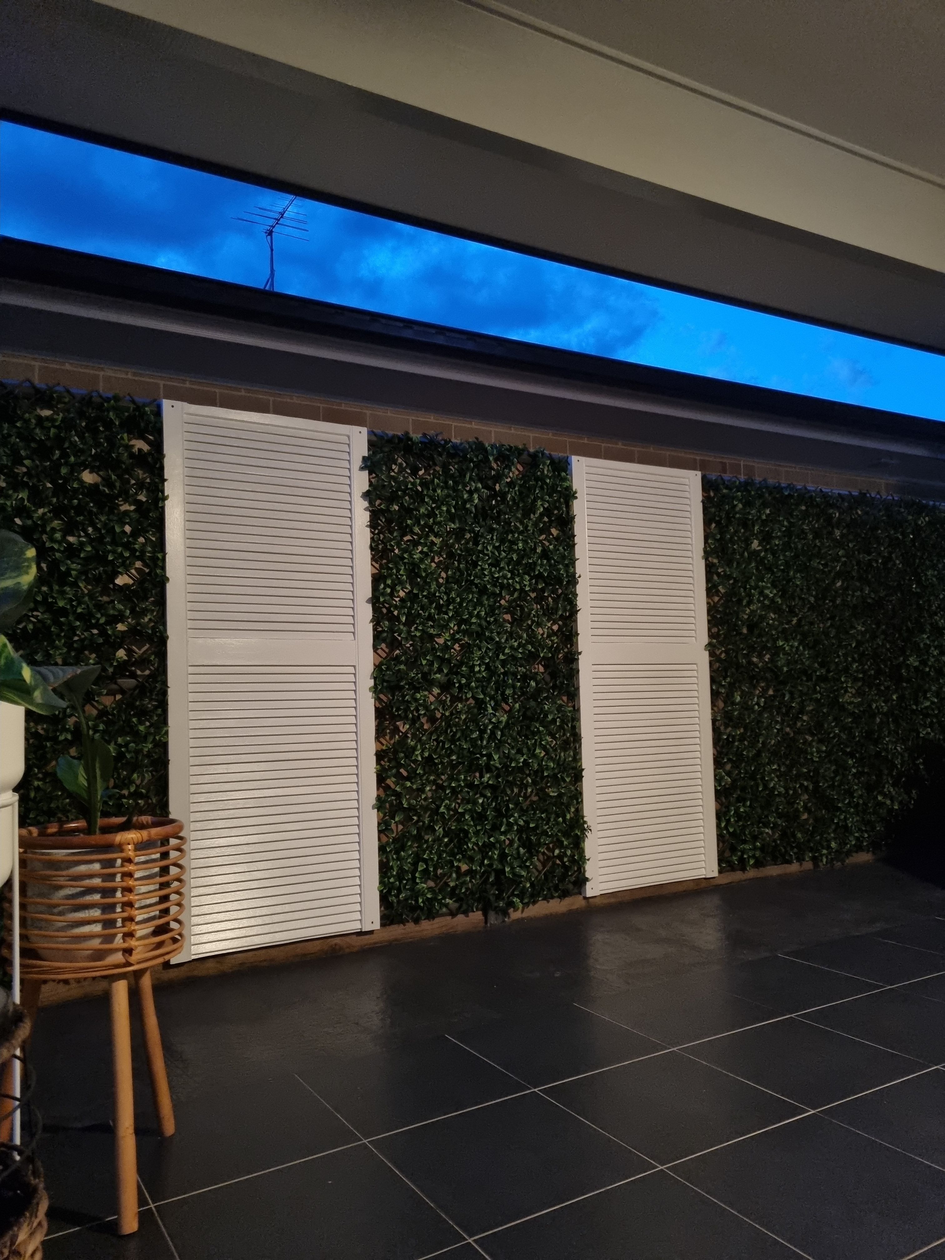 Artificial hedge outdoor feature wall Bunnings community