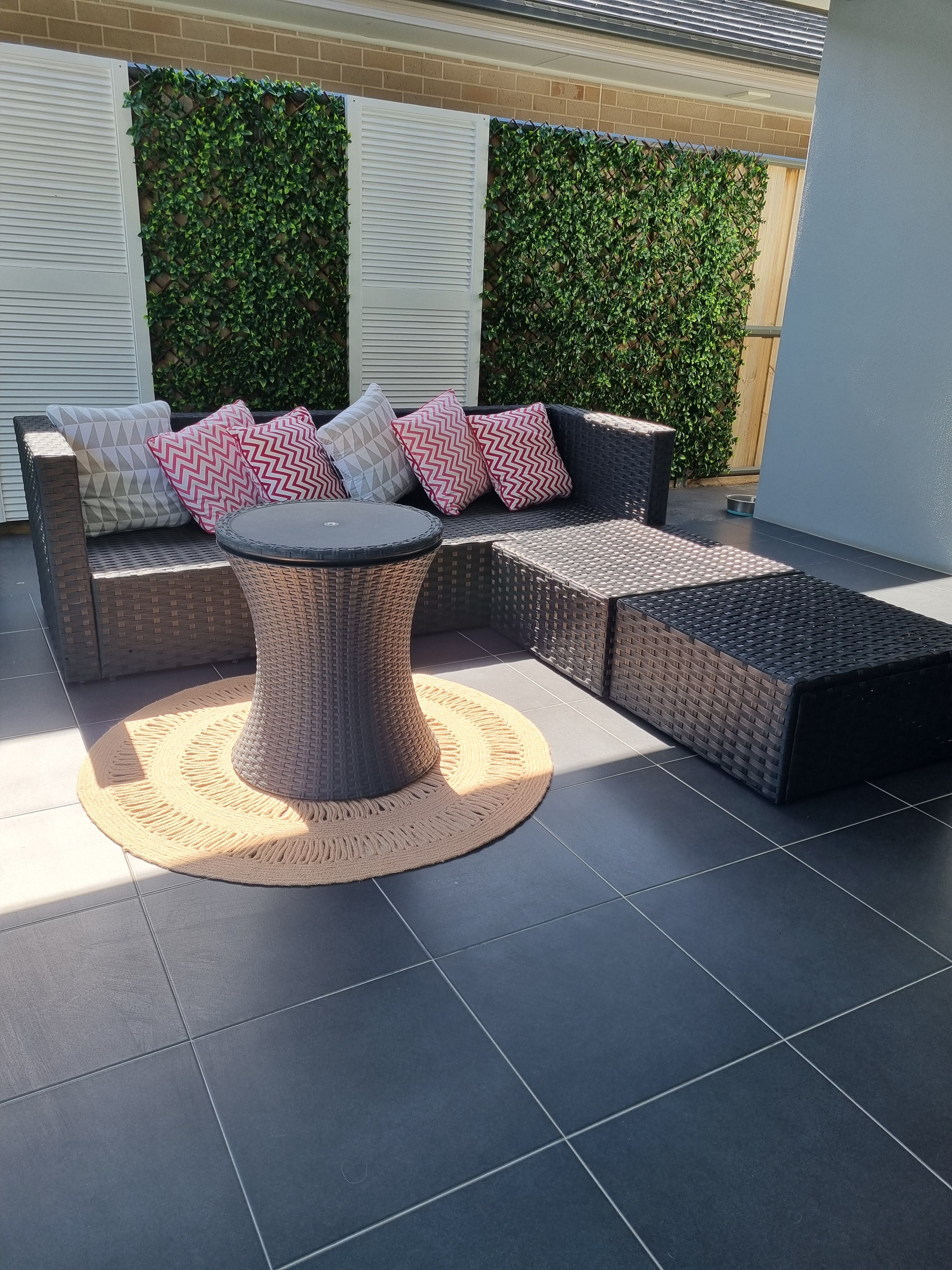 Artificial hedge outdoor feature wall Bunnings community