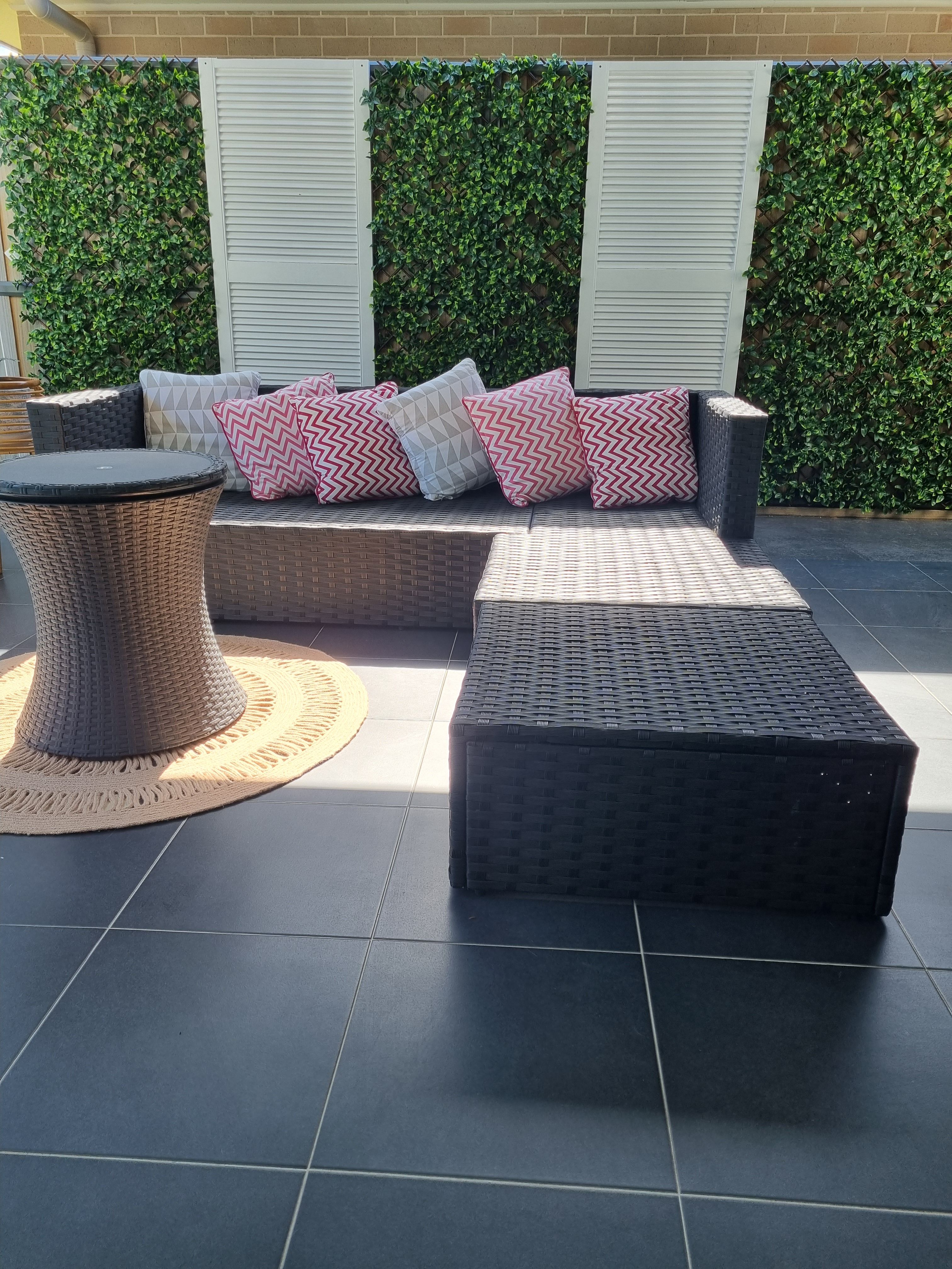 Artificial hedge outdoor feature wall Bunnings community