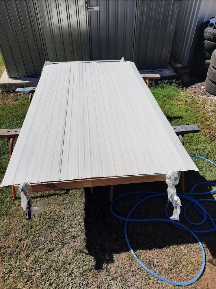 The rest of the cladding is original, I sprayed the front with stone shield paint from SCA before putting back on.