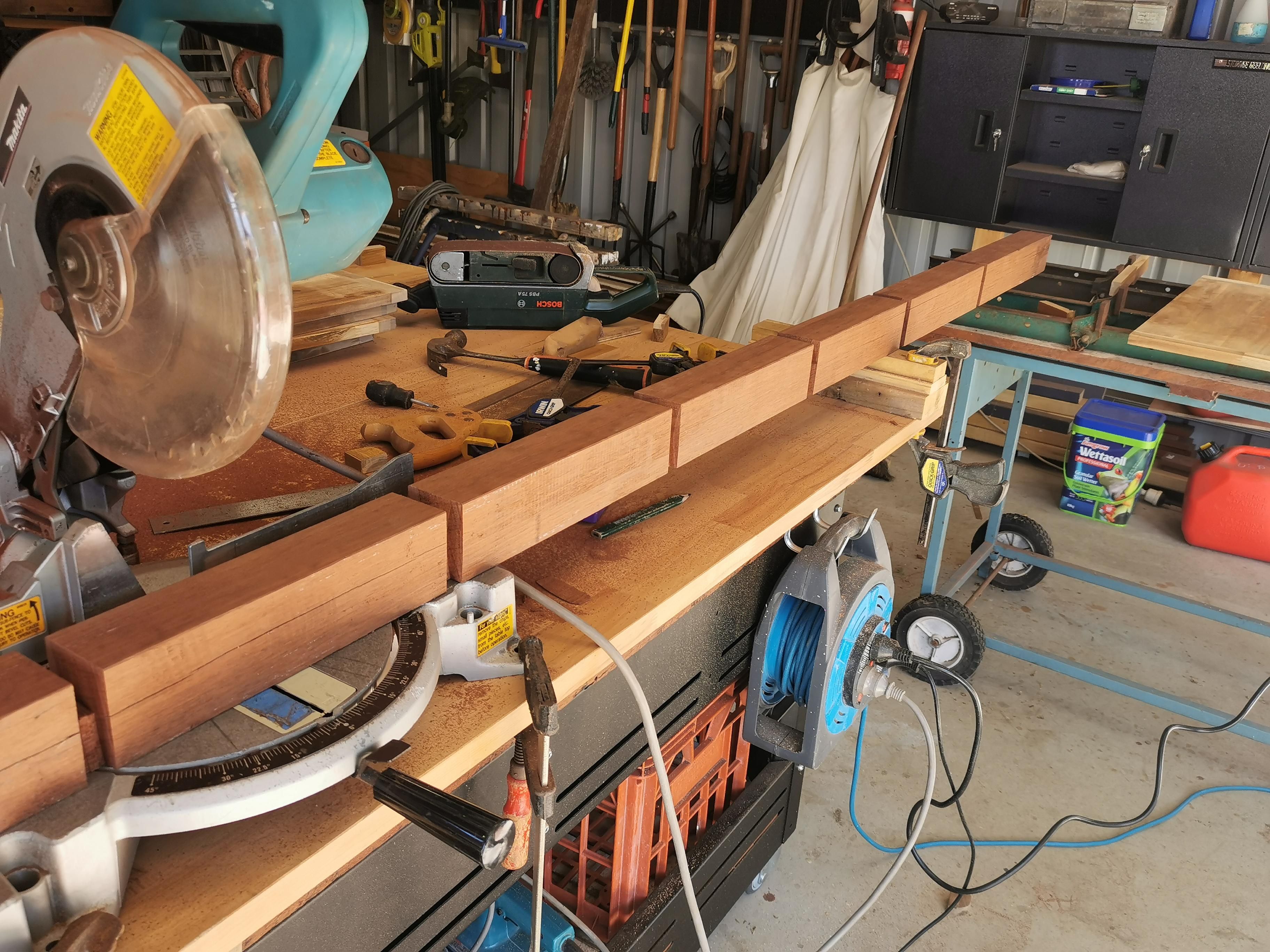 Floating Acacia shelves on Jarrah beam Bunnings community
