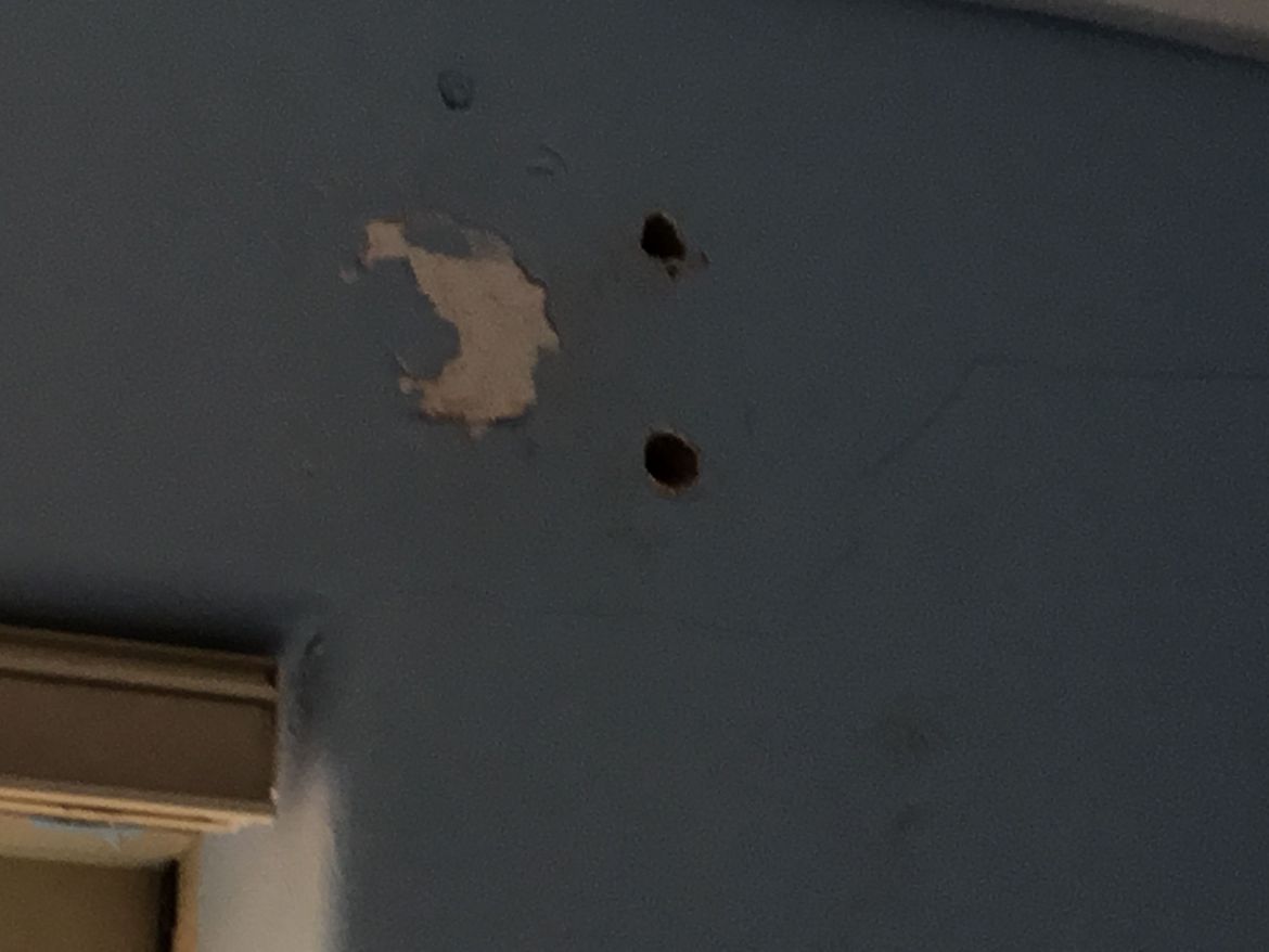 Holes where curtain rails used to be