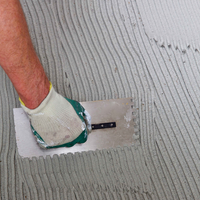 Step 4 Use notched trowel to spread cement base.png