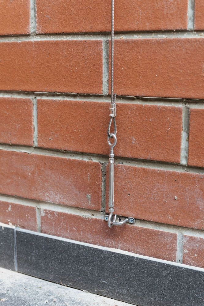 Here's a close up of how it fixes to the wall