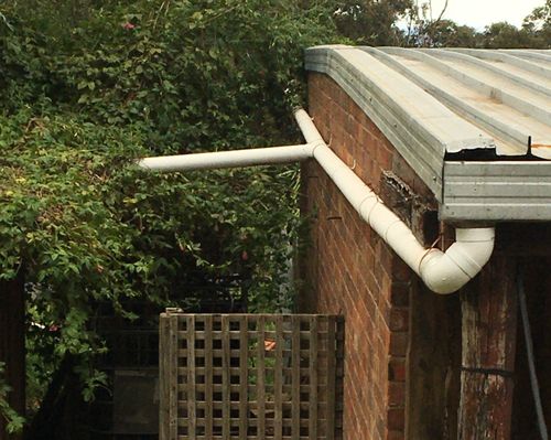 How to merge shed and house downpipes