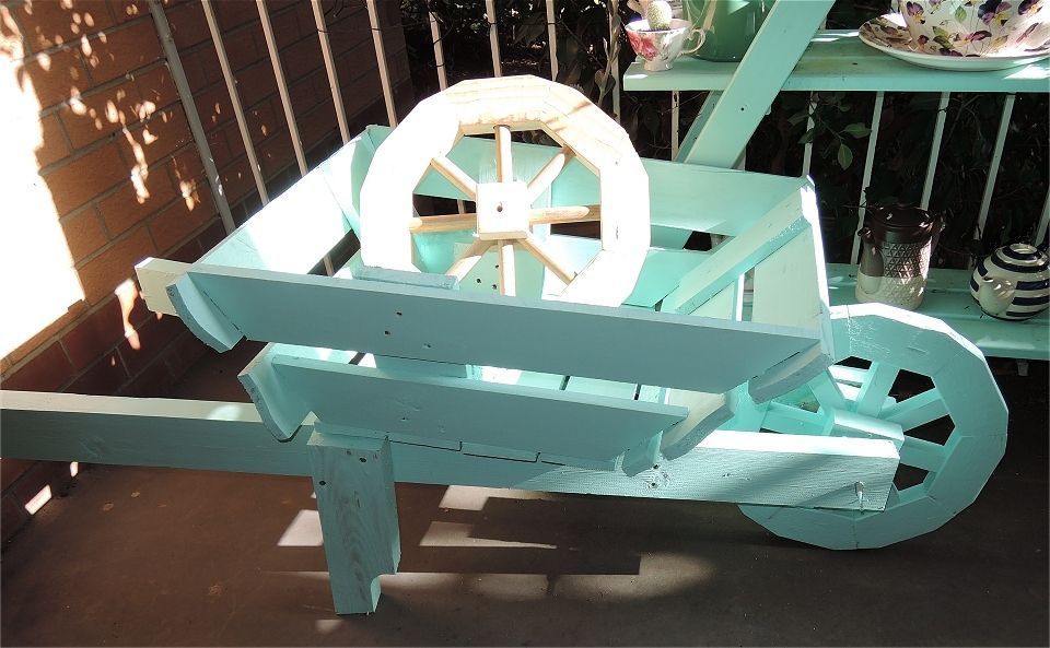 Broomstick wood as wheel spokes.