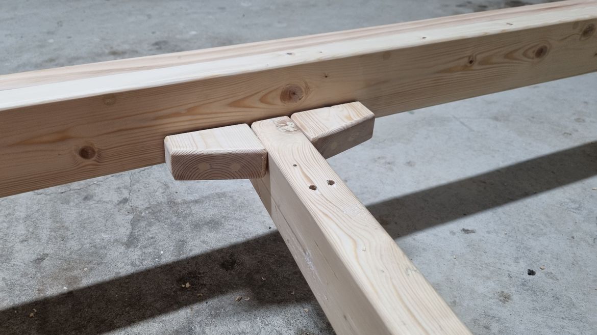 Stops besides middle support to prevent it from moving side to side