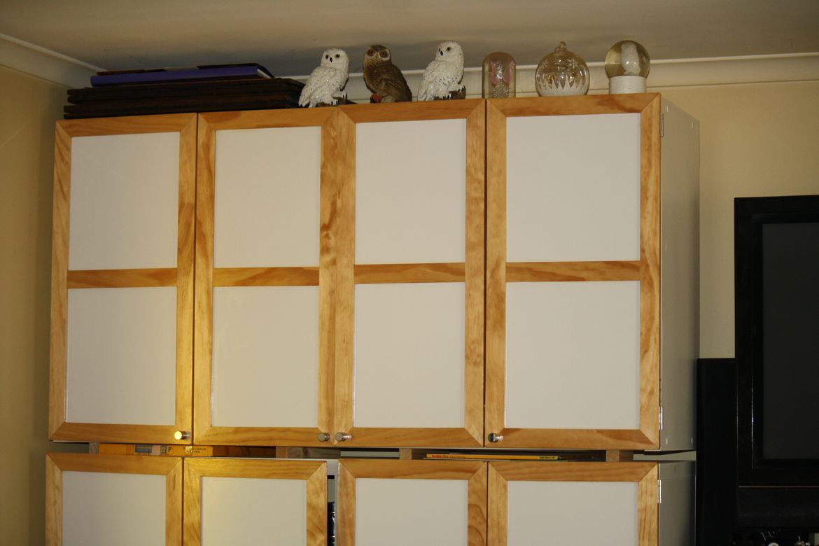 We purchased Cube Shelving from Bunnings & I made & added Bi-Fold Doors .