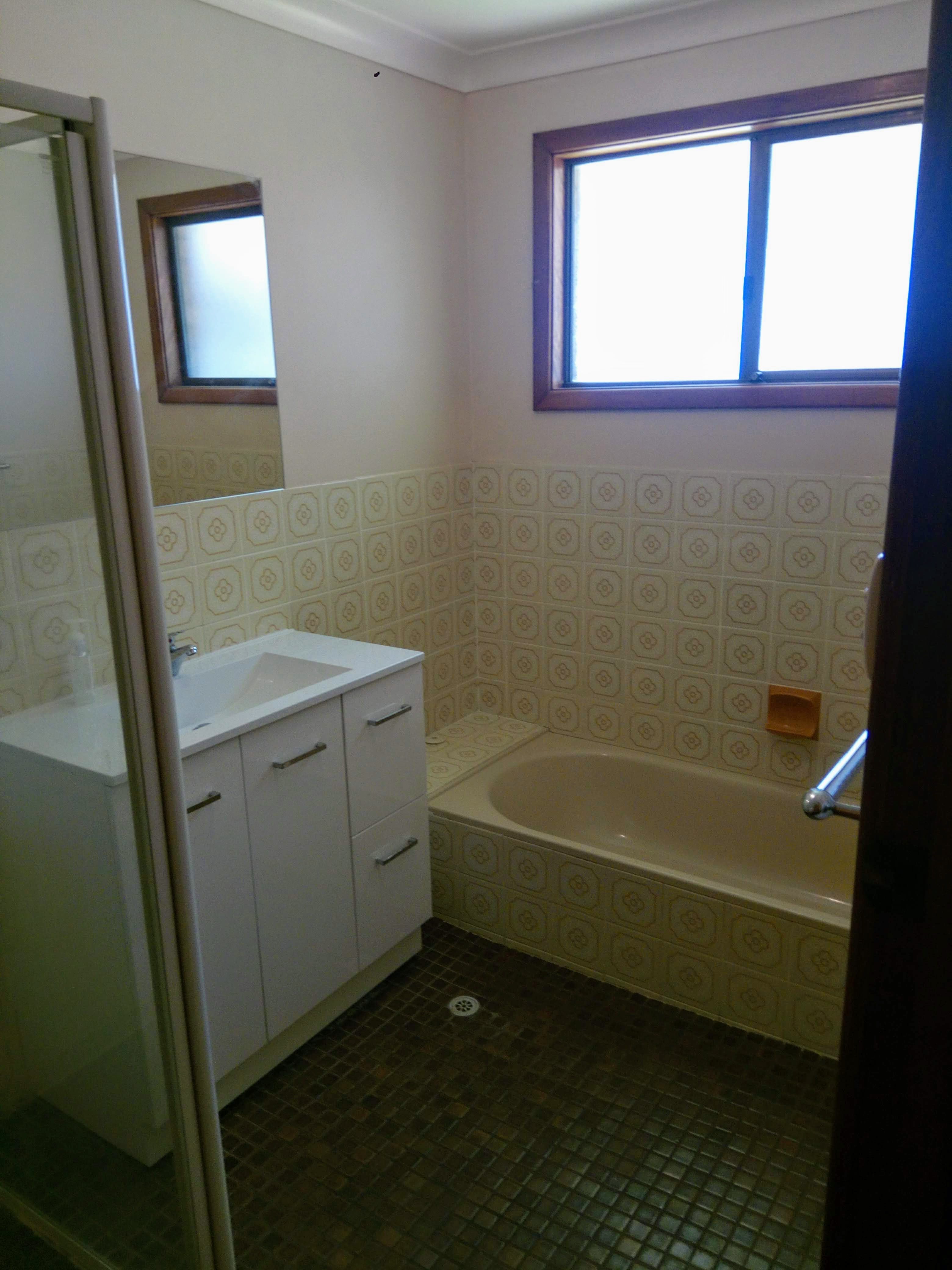 Coastal bathroom reno with folding showe... Bunnings community