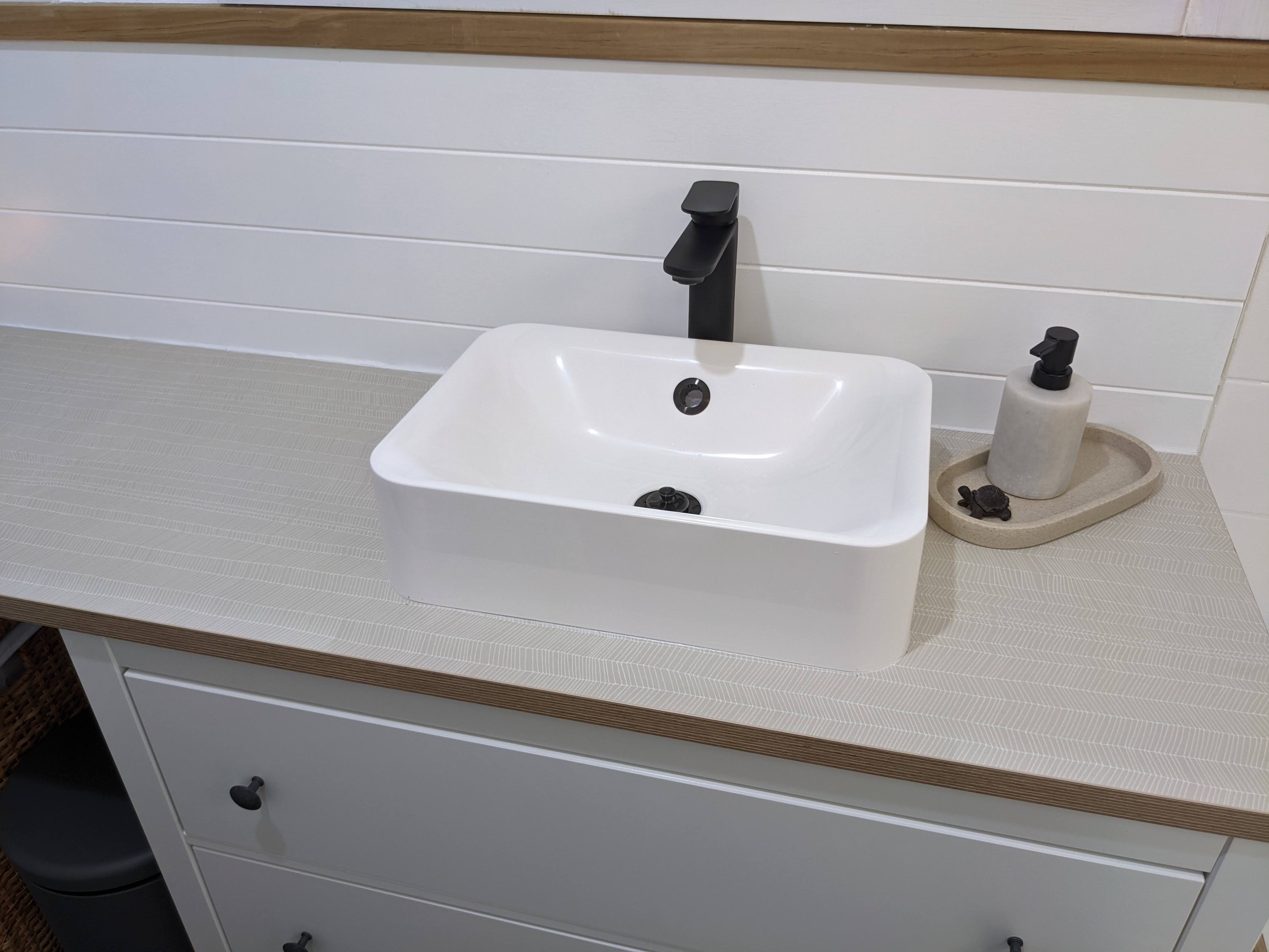 Coastal bathroom reno with folding showe... Bunnings community