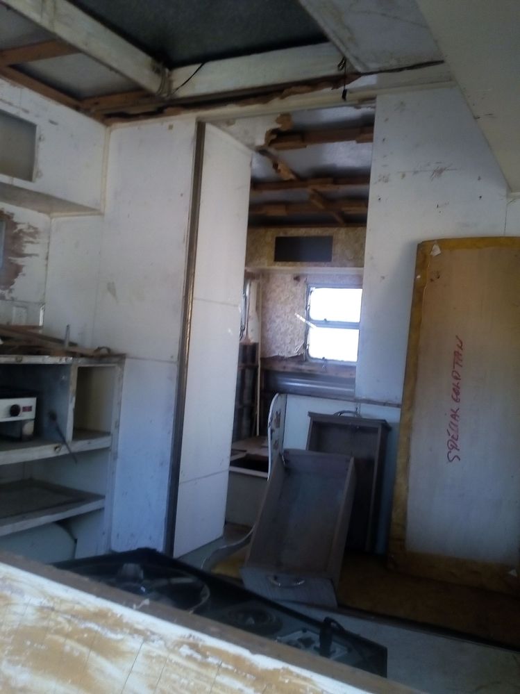 Sitting area looking into bedroom