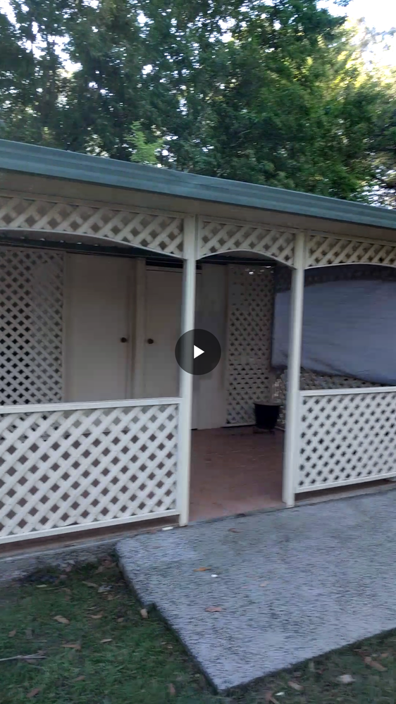 Toilet on the left shower behind the door on the right