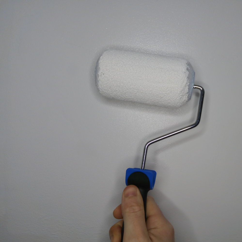 8.2 Applying ceiling paint.png