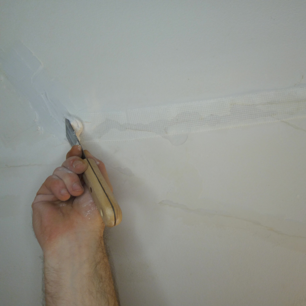 5.3 Applying plaster over tap.png