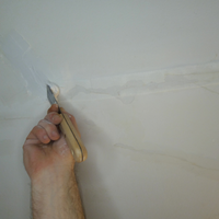 5.3 Applying plaster over tap.png