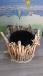 Driftwood pot plant holder.