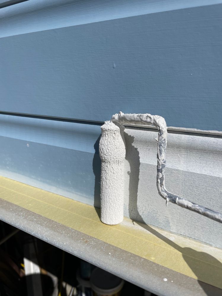 Use a smaller roller, here 100mm, for edges. This was a long nap too and you can see it conforming to the shape of the weatherboard. And don’t forget to use making tape where needed. It’s faster to mask than to fiddle around painting edges.