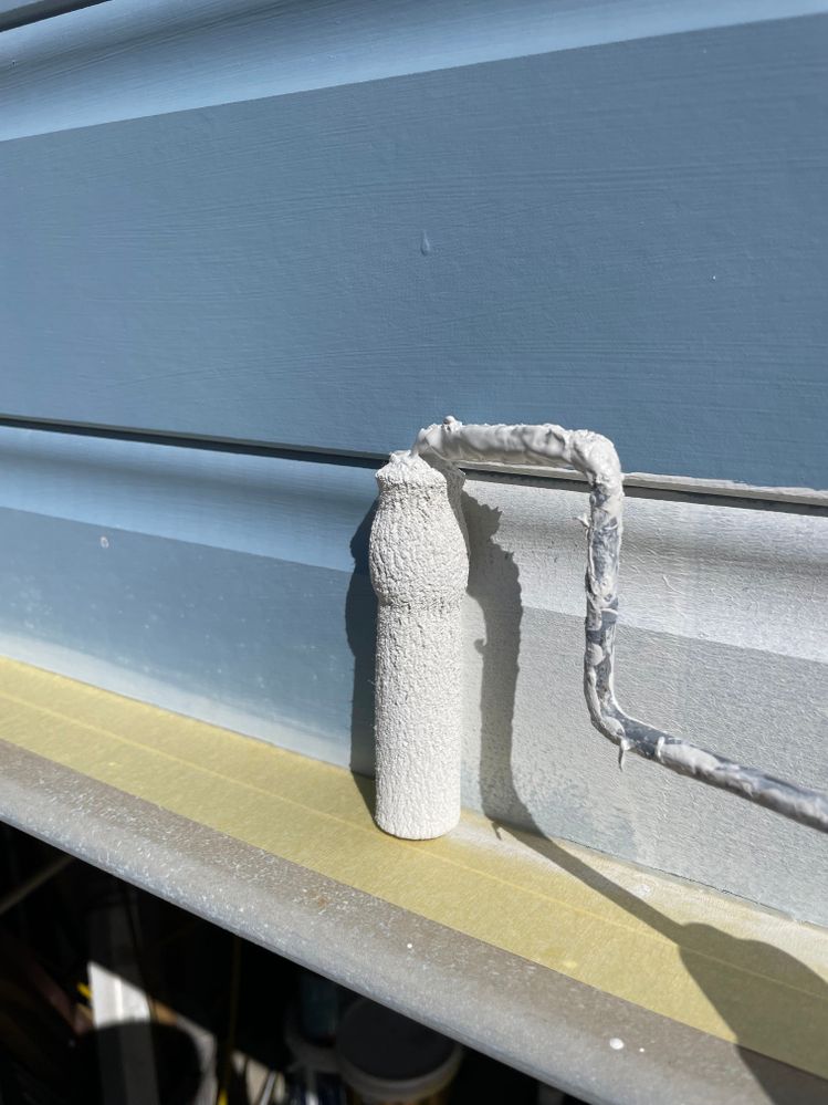 Use a smaller roller, here 100mm, for edges. This was a long nap too and you can see it conforming to the shape of the weatherboard. And don’t forget to use making tape where needed. It’s faster to mask than to fiddle around painting edges.