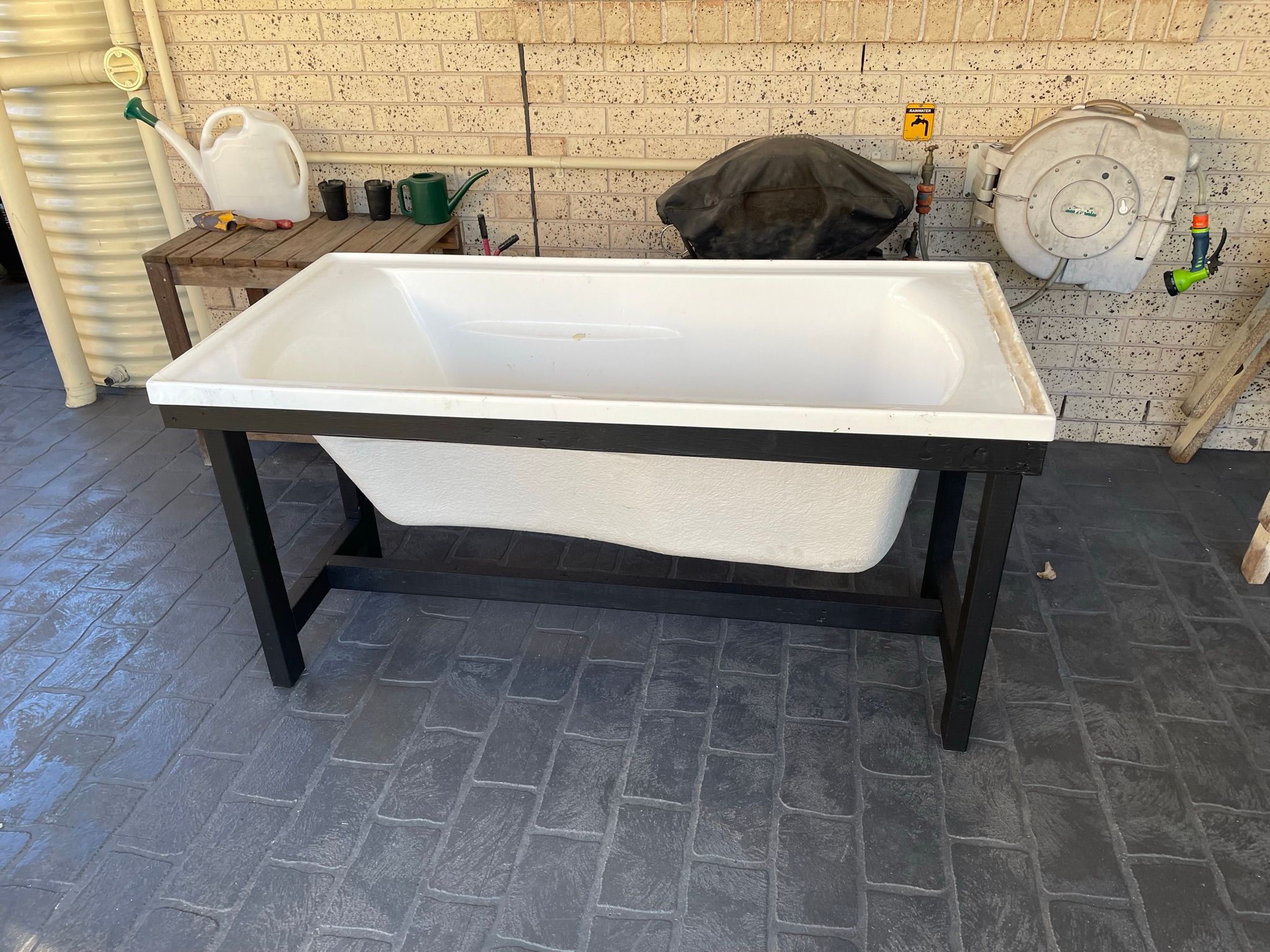 Upcycled bathtub worm farm Bunnings community