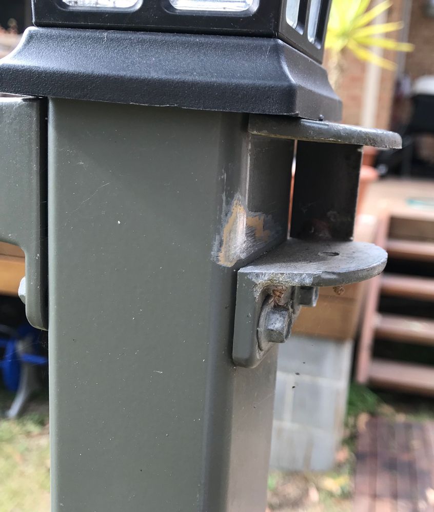 cut away to allow gate to rest and open