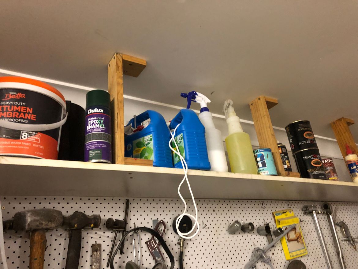 Timber rail under peg board