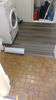 vinyl-flooring-over-laundry-tiles.jpg