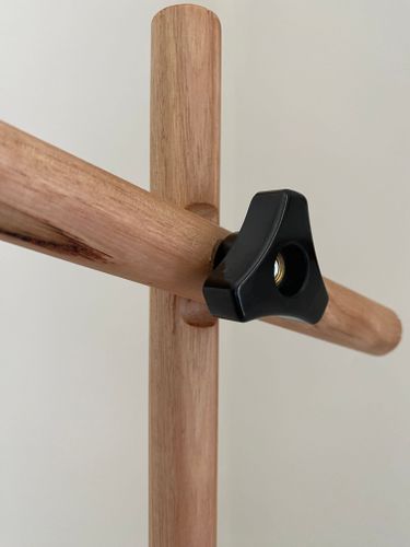 Dowel routed to adjust angle easily and secured by hand nut and bolt.