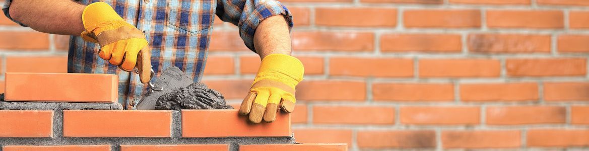 man-laying-bricks.jpeg