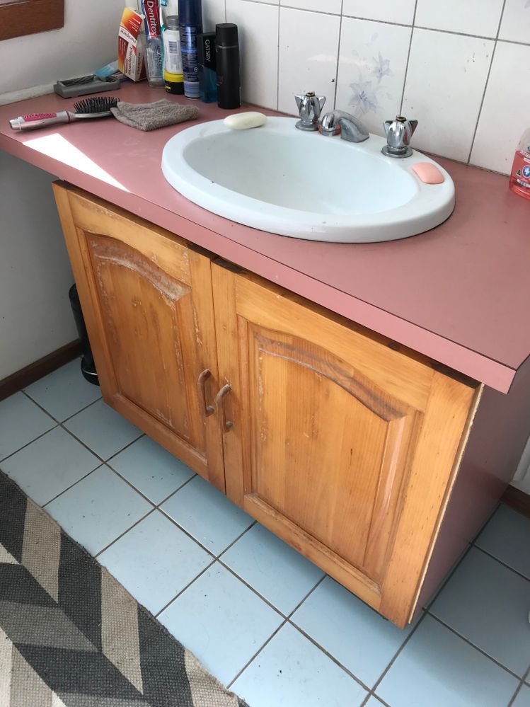 Bathroom sink. Goodbye pink!