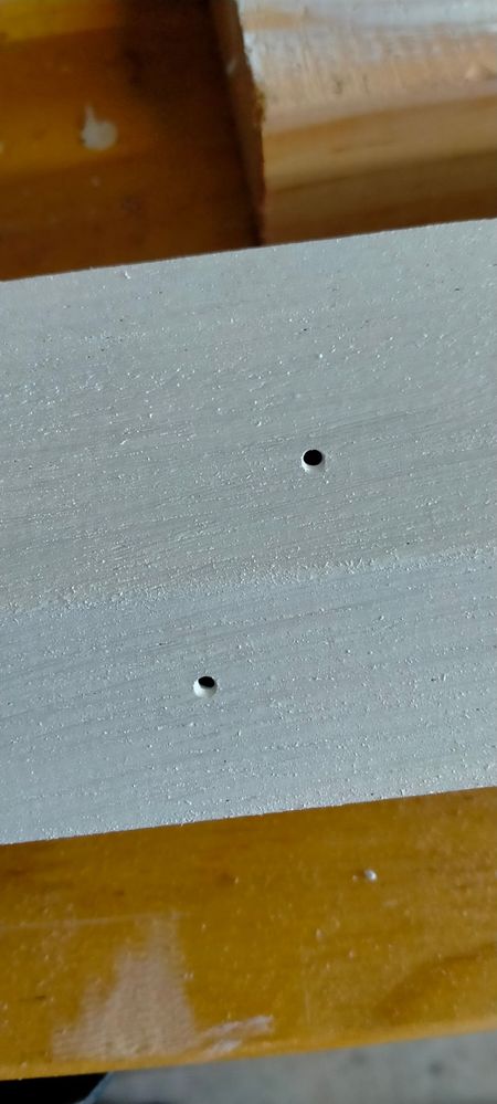 Holes in timber