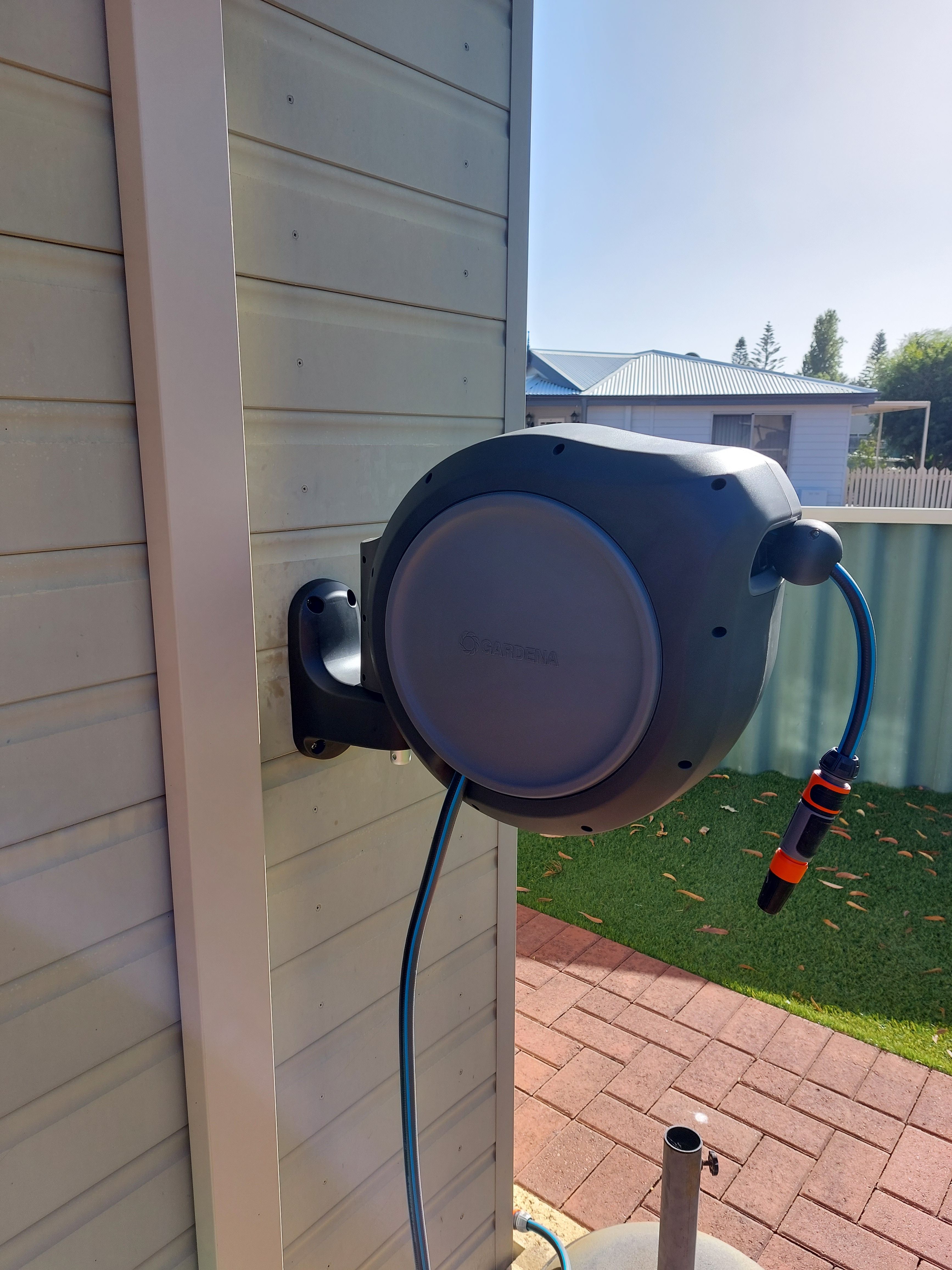How to mount a Gardena hose reel to clad... Bunnings community
