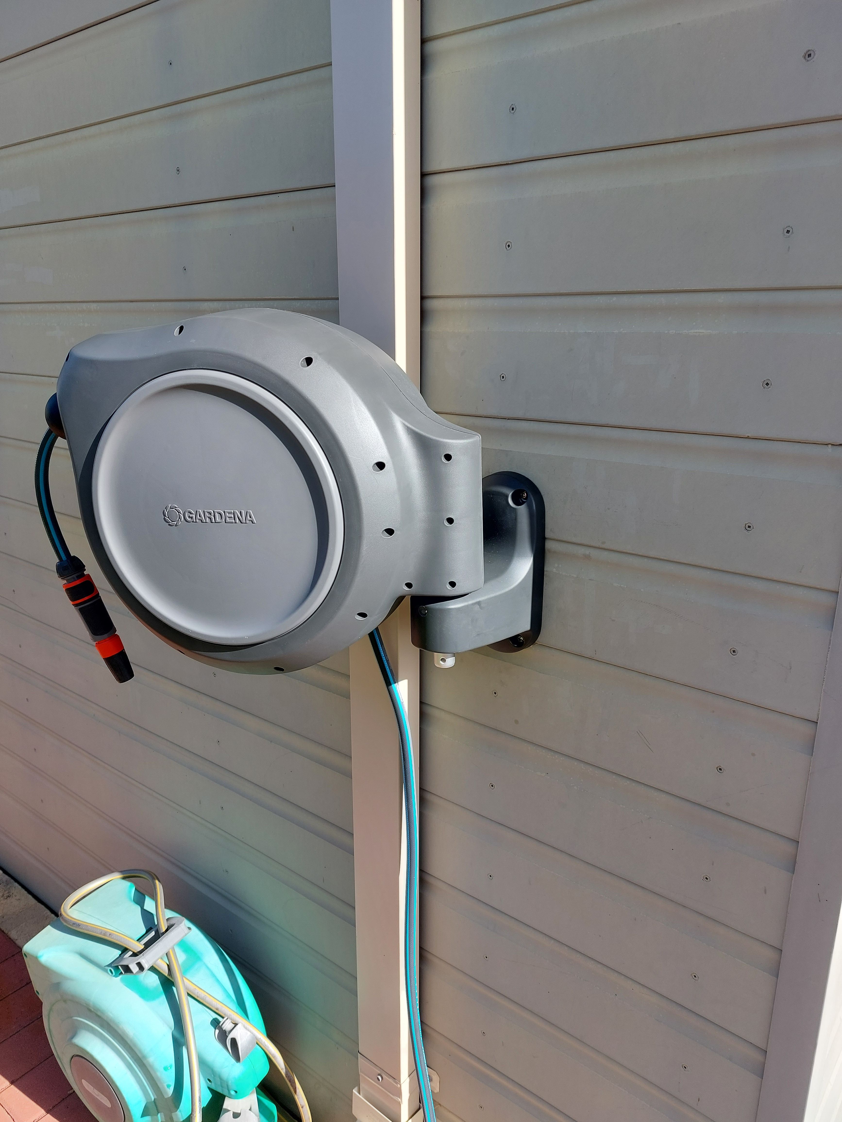 How to mount a Gardena hose reel to clad... Bunnings community
