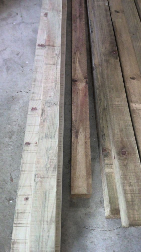 Sanded planks are the three on the left what are the black streaks? Do I sand until they're gone for a good result?