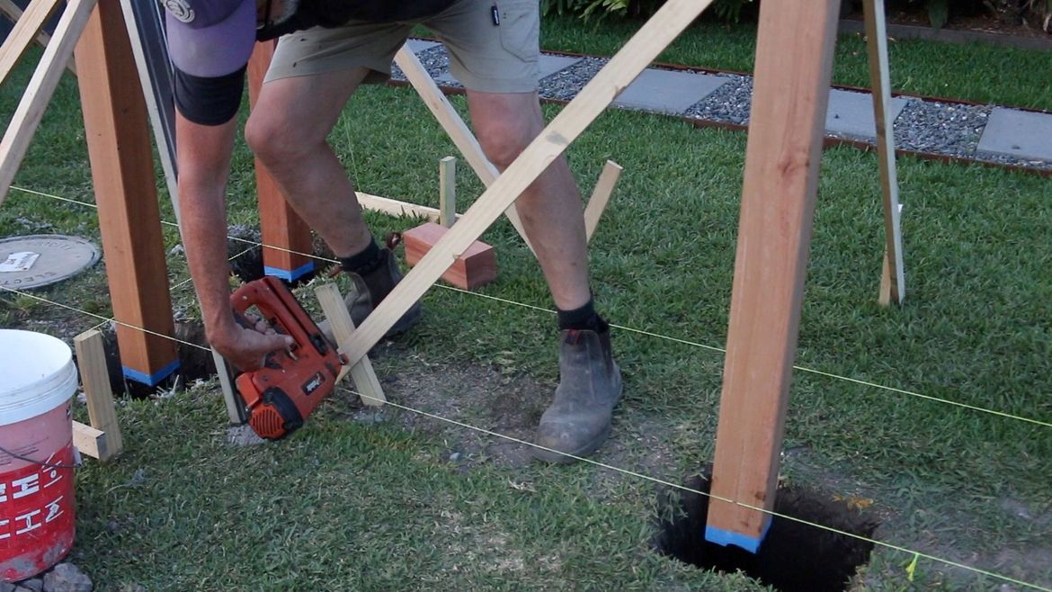 Using braces to hold the posts straight and plumb.