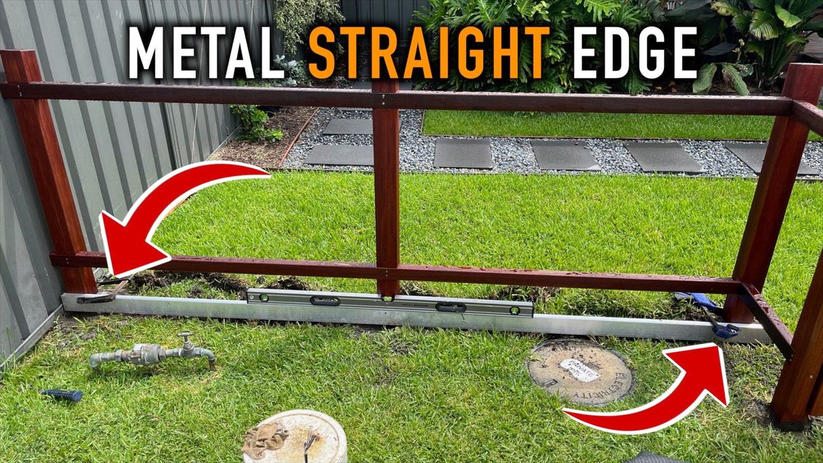 Using a straight edge screwed to the posts as the base to sit the battons on when attaching them to the rails.